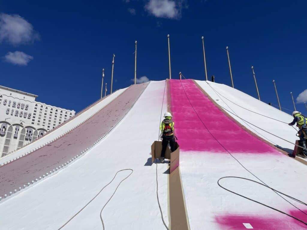 Roof coating application in progress — Hotel and casino