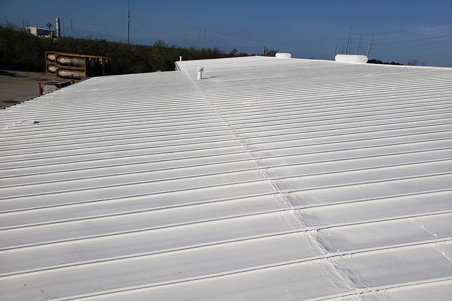 Standing Seam Metal Roof Restoration at a North Charleston SC Logistics Facility — completed roof coating project