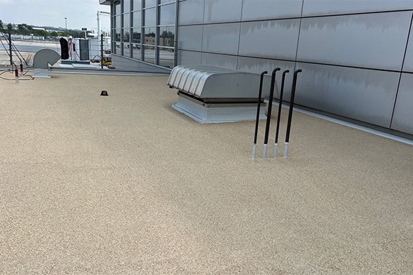 TPO Roof Restoration at a Regional Airport Terminal in Middletown PA — completed roof coating project