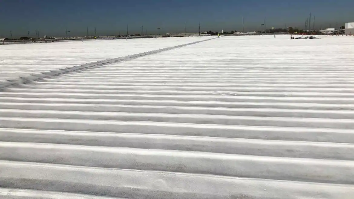 Foam and Silicone Rebuild a Tornado-Damaged Million-Square-Foot Warehouse Roof in Garland TX — completed roof coating project
